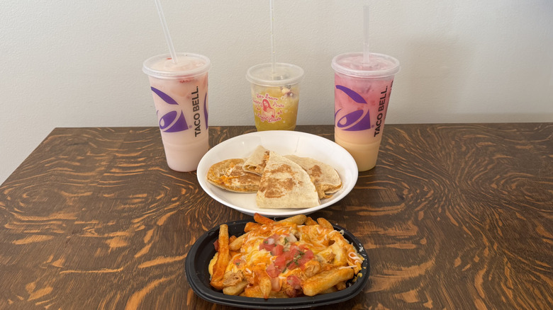 New Taco Bell items including three beverages, loaded nacho fries, and two Crunchadillas