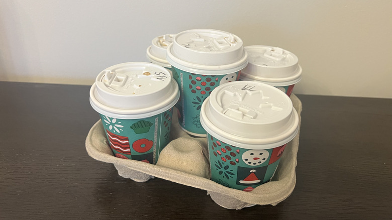 Tim Hortons' protein lattes in drink carrier.