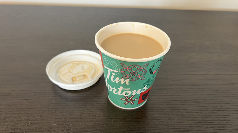 Tim Hortons caramel protein latte in a to-go cup.