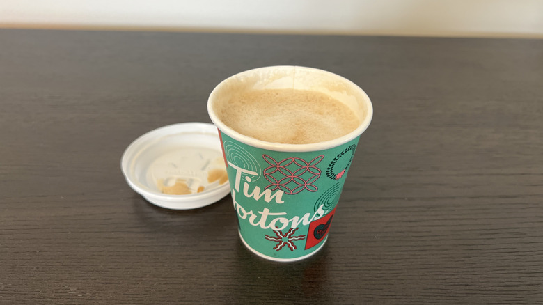 Tim Hortons vanilla protein latte in a to-go cup.