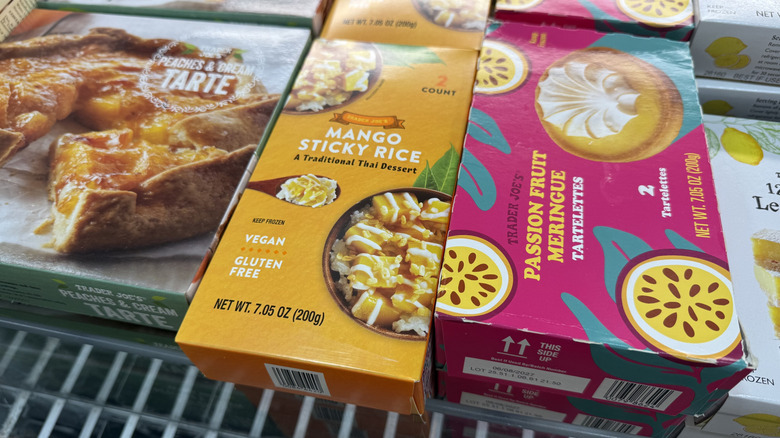 Box of Trader Joe's mango sticky rice alongside other products in freezer