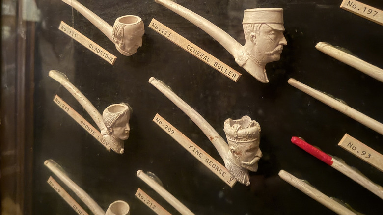Ornate pipes hang on Keens' walls