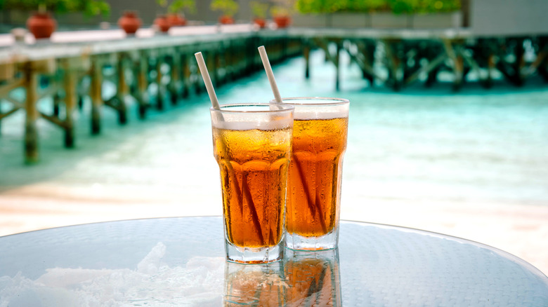 Glasses of iced tea at beach