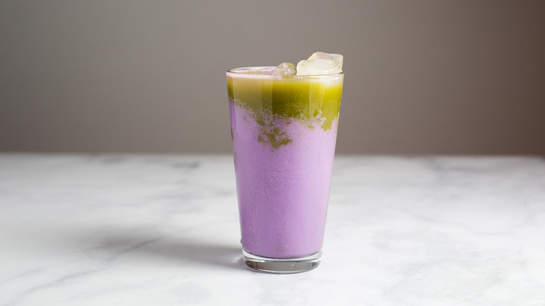 purple iced latte on table