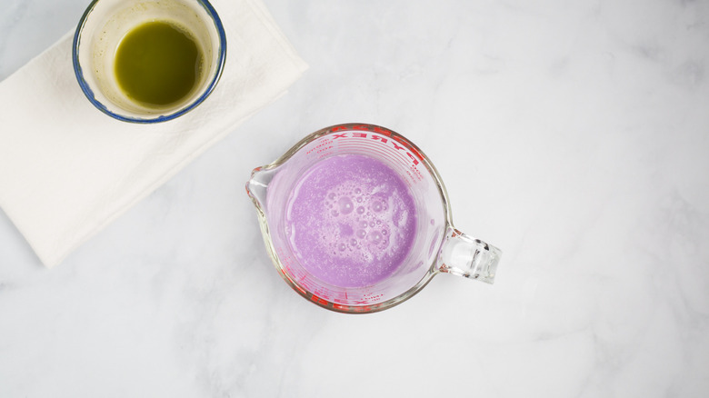 purple liquid in measuring cup