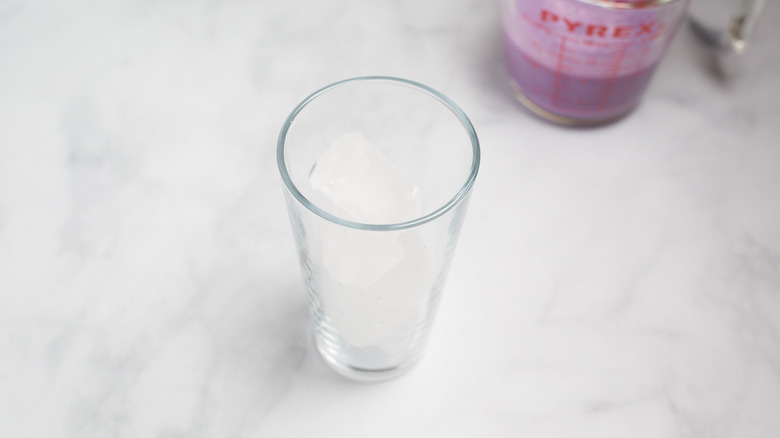 tall glass filled with ice