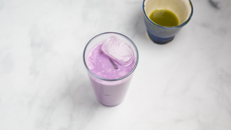 purple milk in tall glass