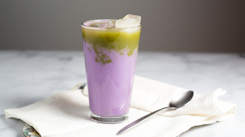 ube matcha latte on table