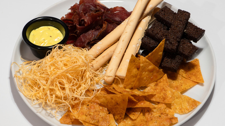 appetizer plate with cheese straws