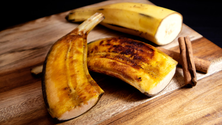 Scorched grilled bananas with a cinnamon quill