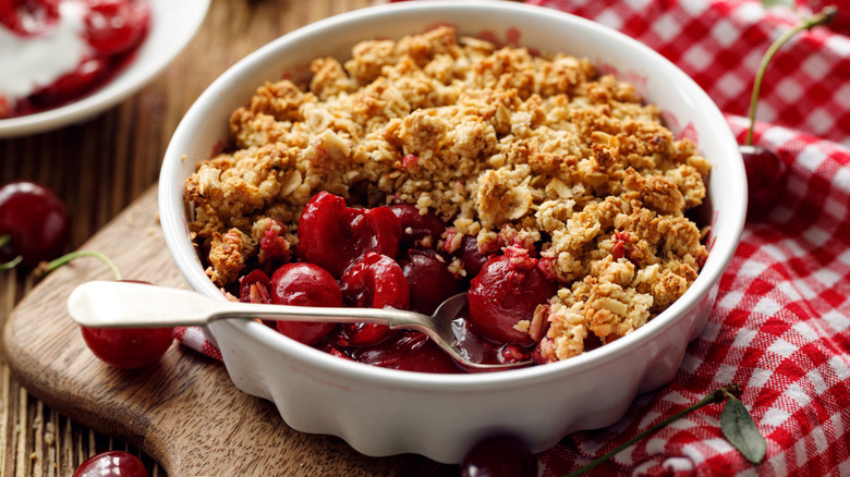 A bowl of cherry crumble.