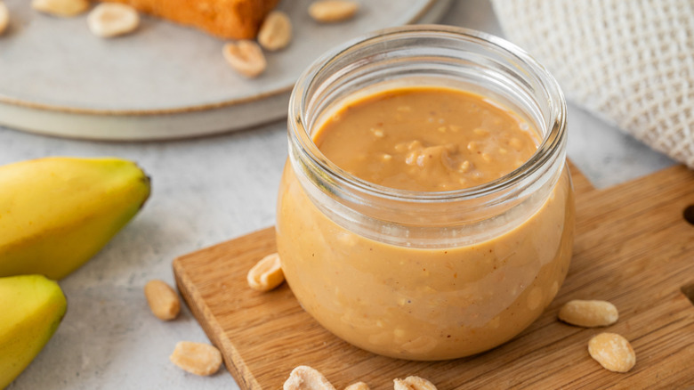 A jar of peanut butter with