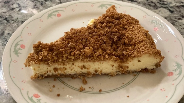 Homemade double crust cheesecake on plate