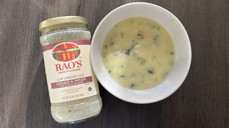 Rao's Sausage & Potato soup in a bowl next to empty jar