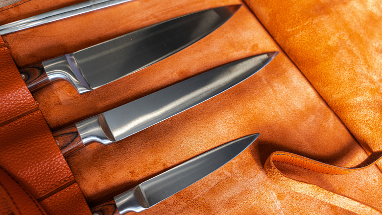 chef knives in leather knife rolll