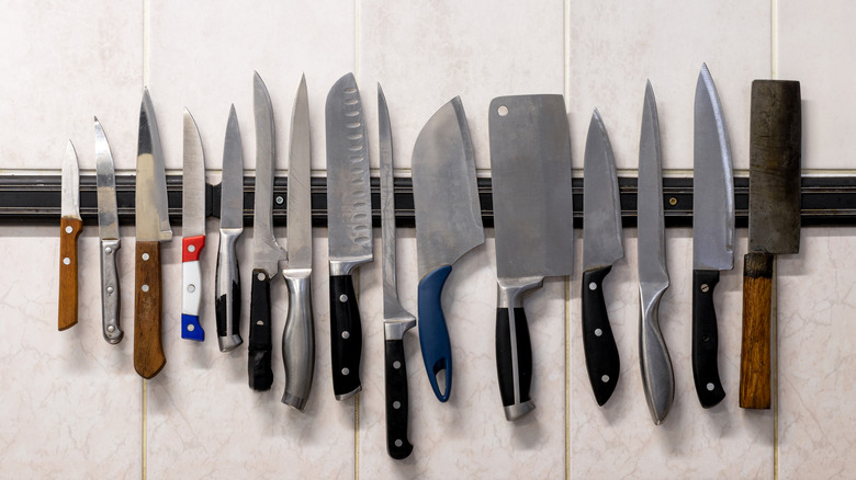 selection of knives on a magnetic knife strip
