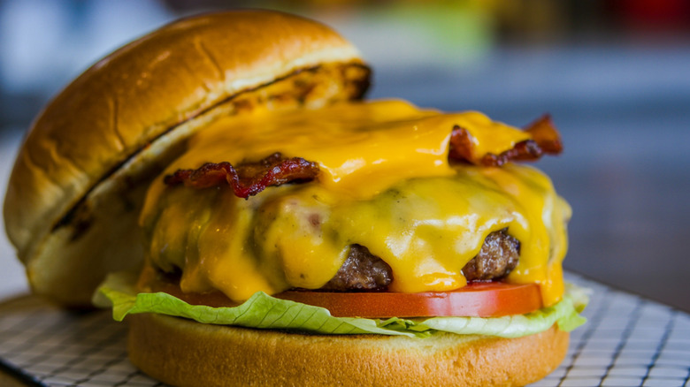 bacon cheesburger on paper