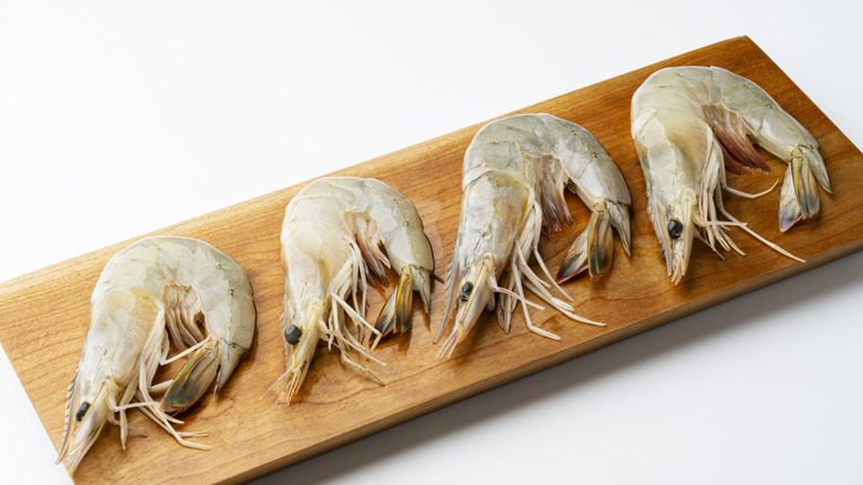 Closeup of jumbo shrimp on a wood board