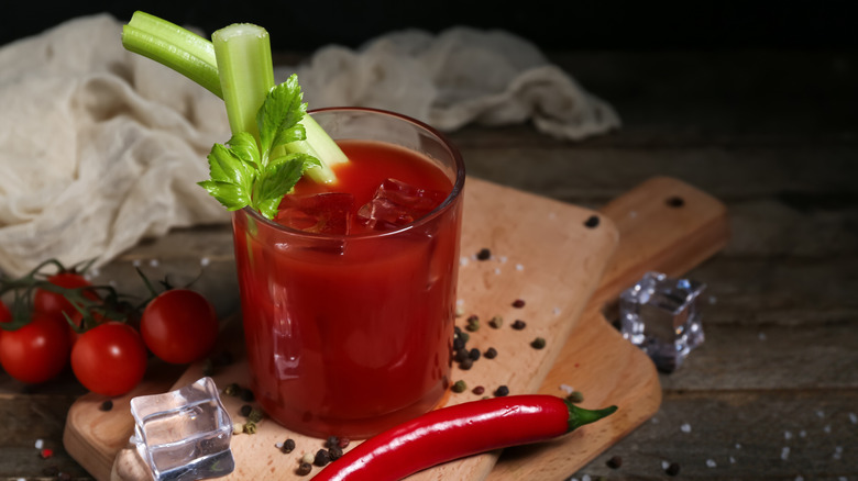 Bloody Mary with celery, tomatoes, chili, peppers