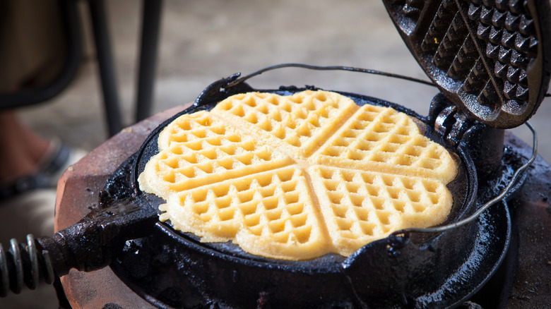 Antique waffle maker with waffles