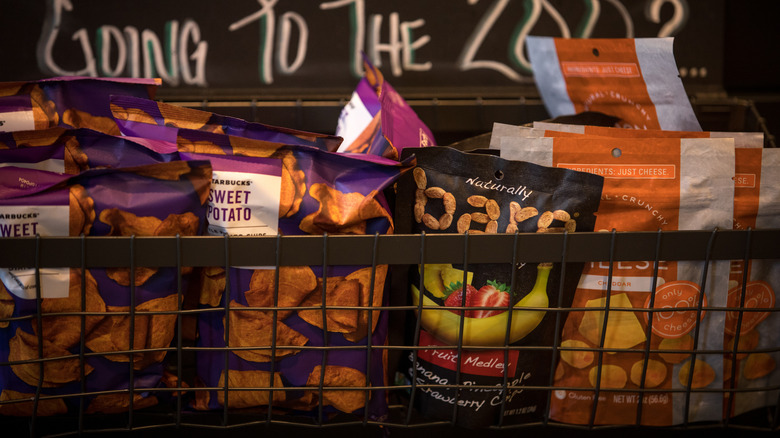 Starbucks impulse buy snacks in a rack