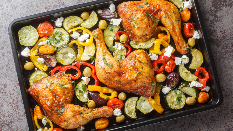 A sheet pan of chicken and vegetables