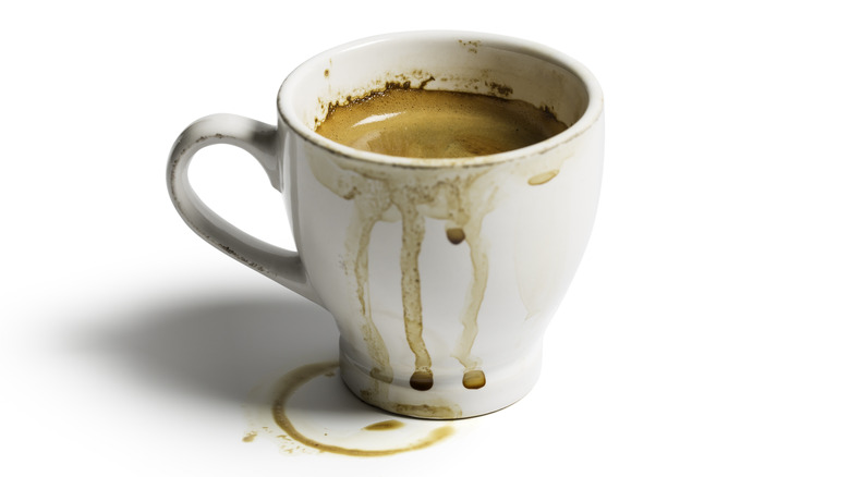 White coffee mug with dirty stains