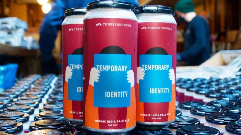 Threes Brewing cans