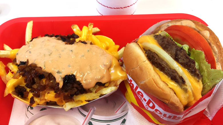a tray with an In-N-Out Double Double burger with a side of Animal-style fries