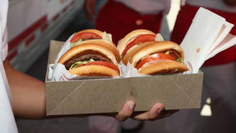 Burgers in cardboard tray