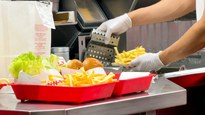 In-N-Out employees preparing orders in the kitchen