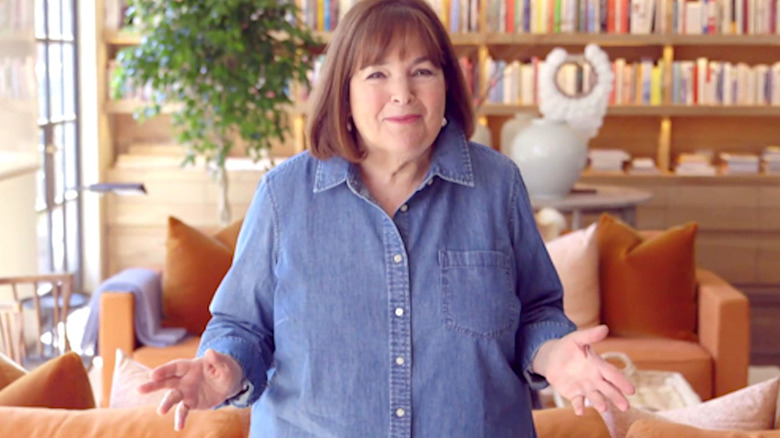 Ina Garten facing the camera in a living room