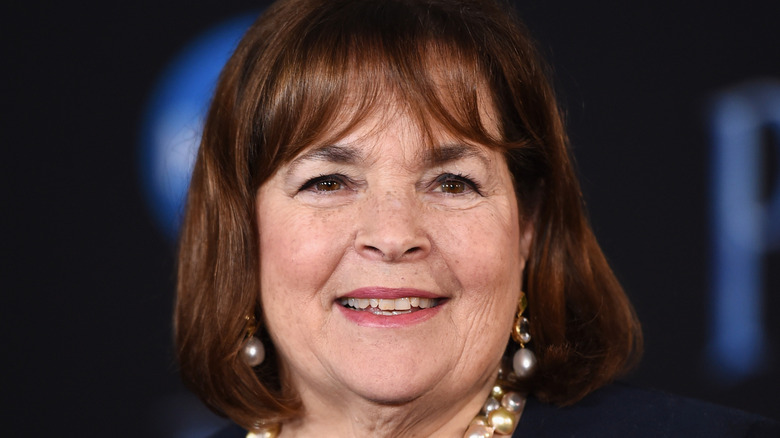 Ina Garten smiling and wearing pearl earrings
