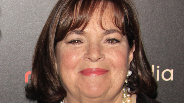  Ina Garten smiles with pink lipstick, pearl earrings