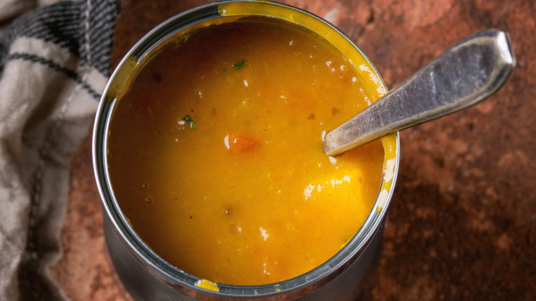 Canned soup with spoon
