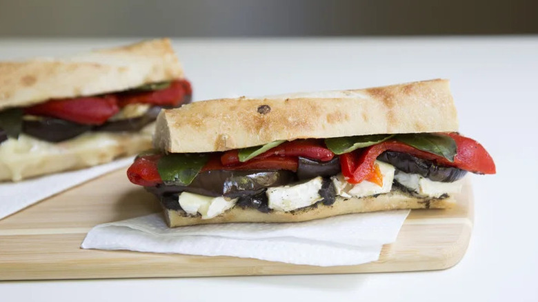 Mediterranean eggplant sandwich with tapenade on a countertop