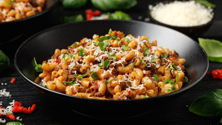 Bowl of Mexican-inspired mac and cheese with chilis and cilantro