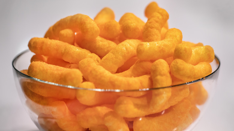 Pile of Cheetohs in glass bowl
