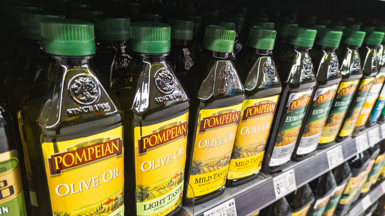 Pompeian bottles of olive oil on a shelf