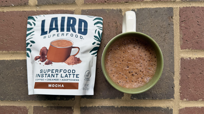 Mug of Laird Superfood mocha instant latte the packaging