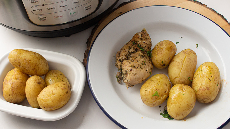 chicken and potatoes on plate