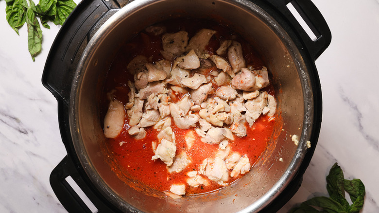 Instant Pot with tomato sauce and chicken