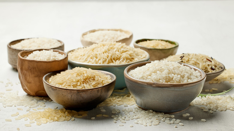 Various bowls filled with different types of rice