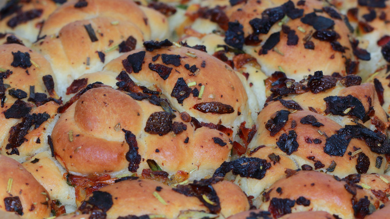 Close-up on monkey bread covered in bacon bits