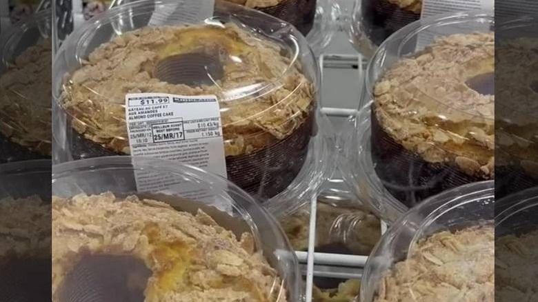 Almond coffee cakes on a rack at a Costco bakery