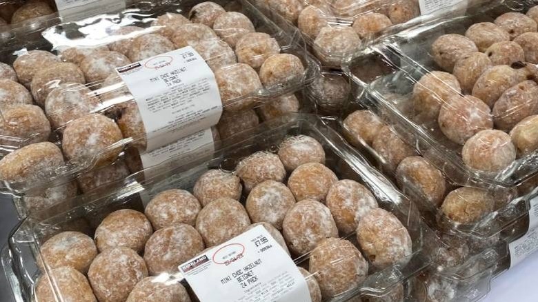 A view of mini chocolate hazelnut beignet packs in a Costco bakery