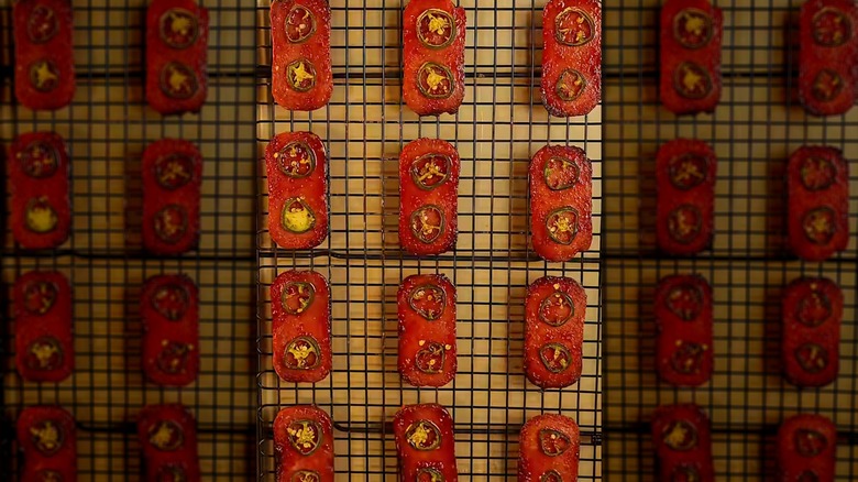 Rows of candied Spam on cooling rack