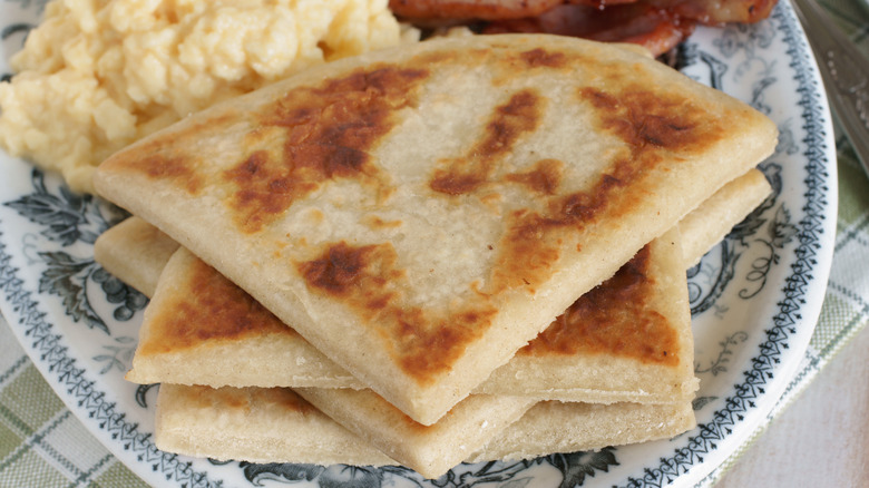 Potato farls on a plate with eggs