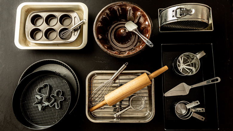 a variety of baking pans and baking utensils 
