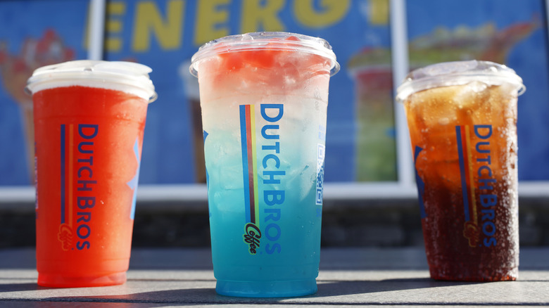 Dutch Bros drinks standing outdoors